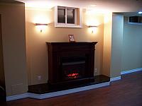 Basement with electric fireplace